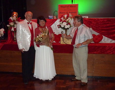 Henry & Jeannie Clark receiving flowers from David Wells of HeartSWell